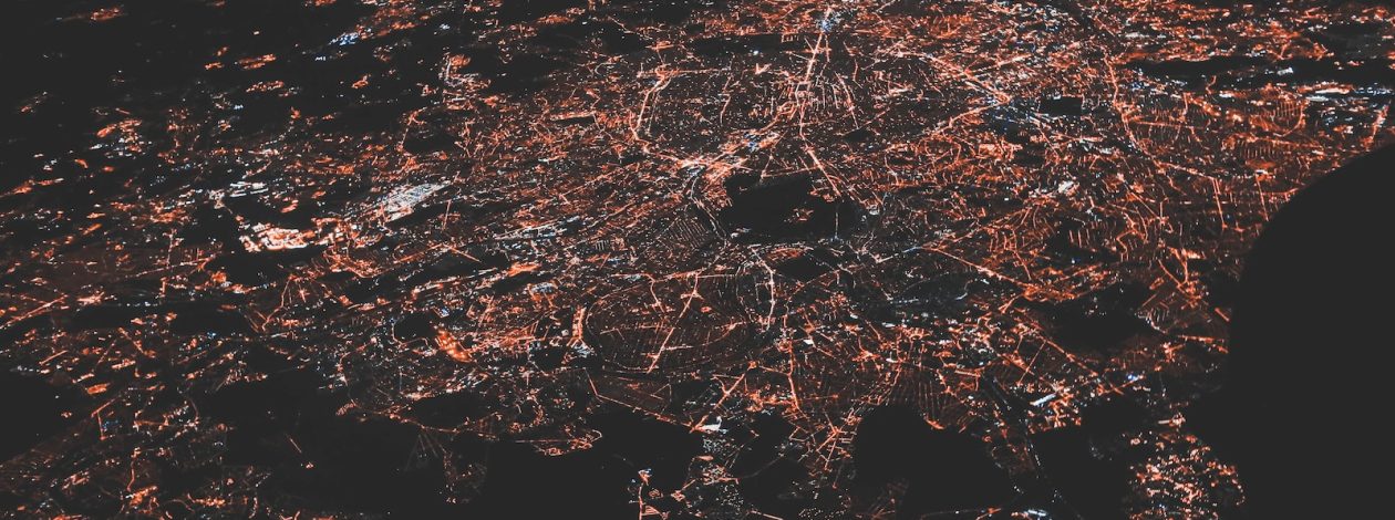 lighted city at night aerial photo